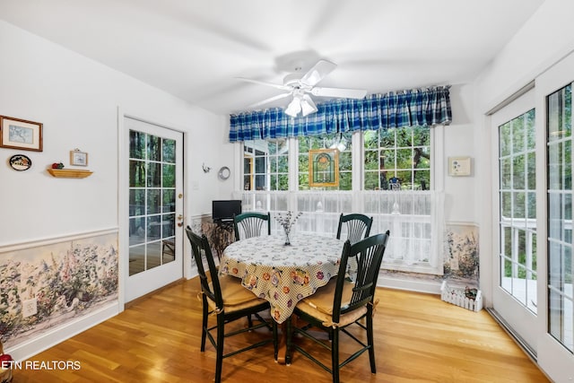 122 Vinita Ln, Loudon, TN 37774 - dining room with wood finished floors and plenty of natural light
