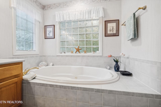 122 Vinita Ln, Loudon, TN 37774 - full bathroom featuring plenty of natural light, a garden tub, and vanity