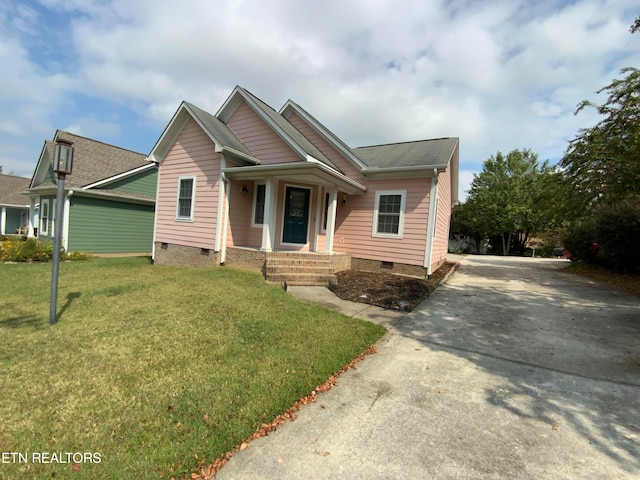 view of front of home with a front yard