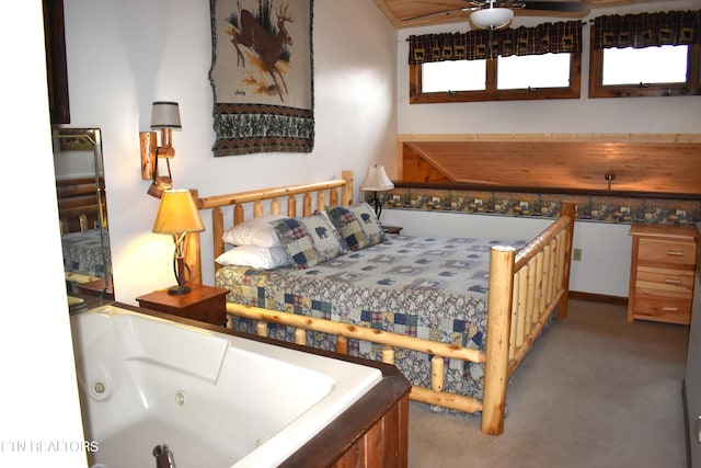 bedroom featuring ceiling fan, carpet, and multiple windows