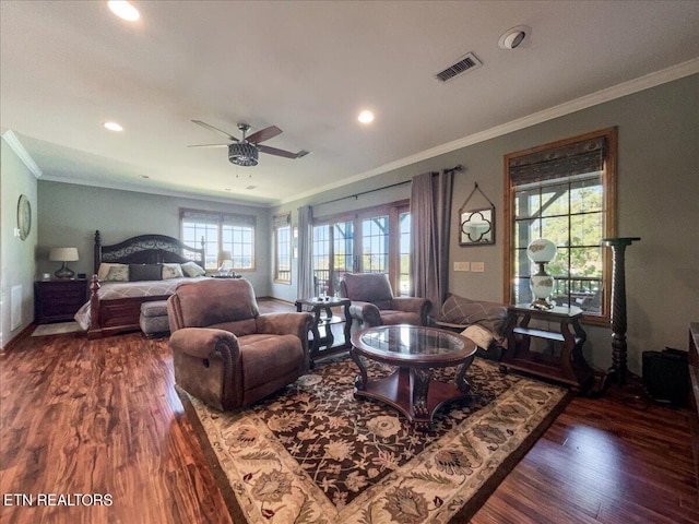 living room featuring ceiling fan, crown molding, and dark wood-type flooring