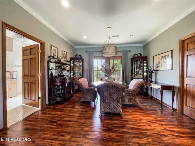 living room featuring ornamental molding and dark hardwood / wood-style flooring