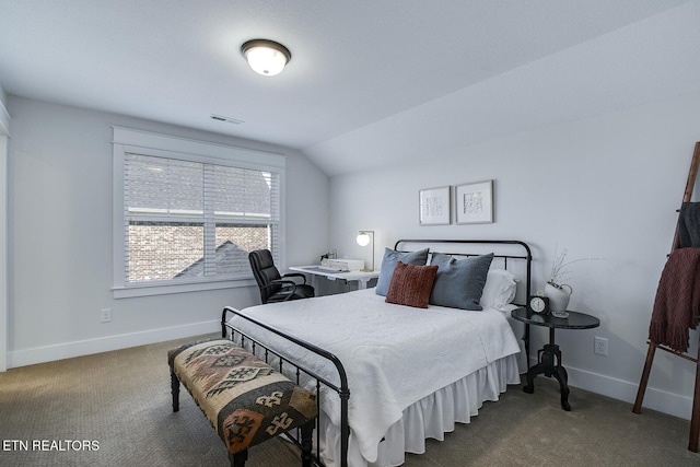 carpeted bedroom featuring visible vents, baseboards, and vaulted ceiling
