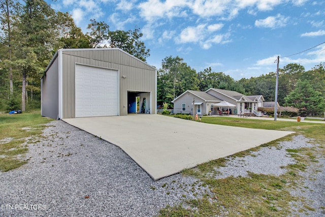 garage featuring a yard