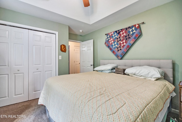 bedroom featuring a closet, carpet, and ceiling fan