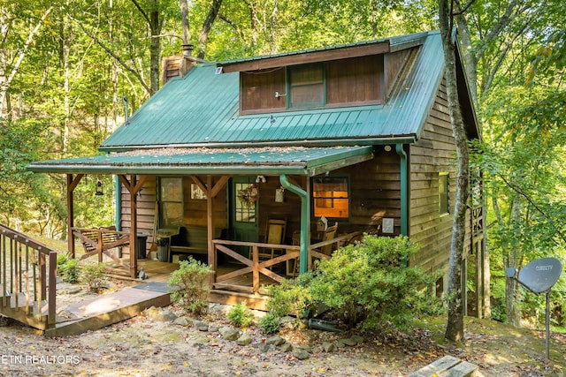 exterior space featuring a wooden deck