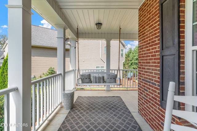 balcony featuring covered porch