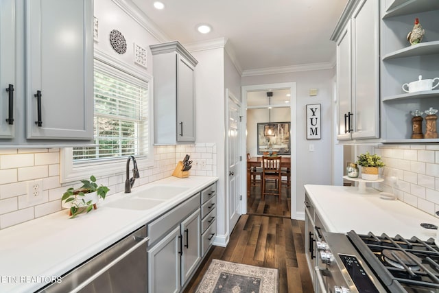 kitchen with gray cabinets, dark hardwood / wood-style floors, and sink