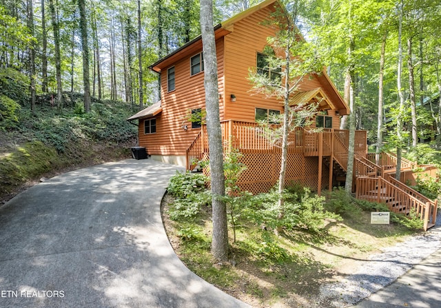 view of front of house featuring a wooden deck