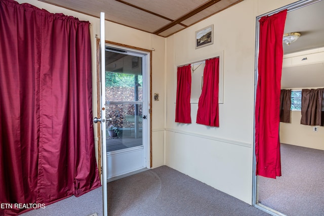 interior space featuring carpet