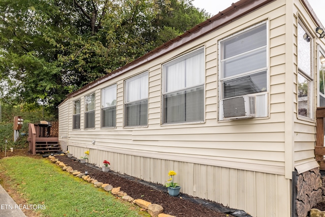 view of home's exterior featuring a deck