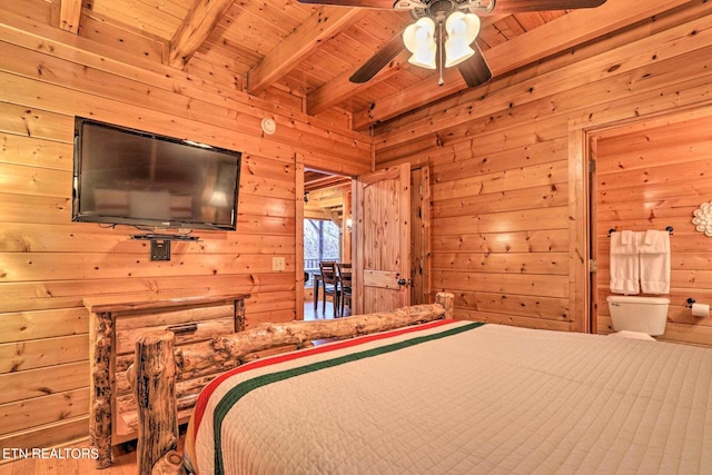 bedroom featuring wood ceiling, wood walls, beamed ceiling, and hardwood / wood-style flooring