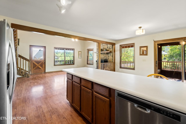 kitchen featuring wood-type flooring and stainless steel appliances