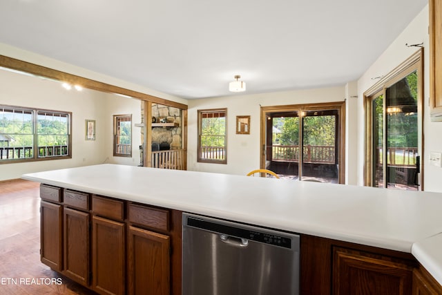 kitchen featuring wood-type flooring and dishwasher