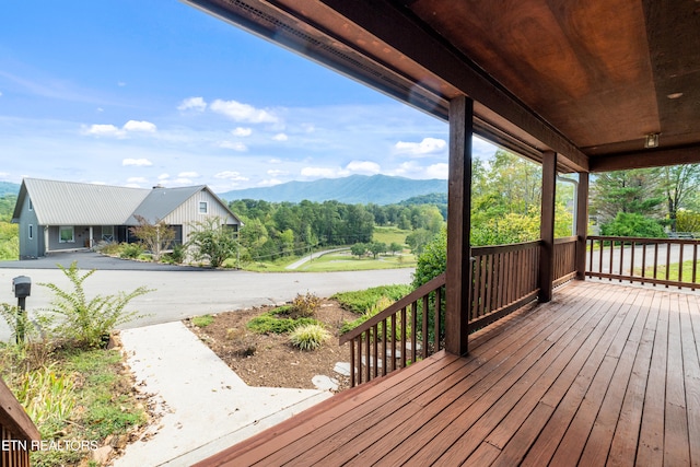 wooden terrace with a mountain view