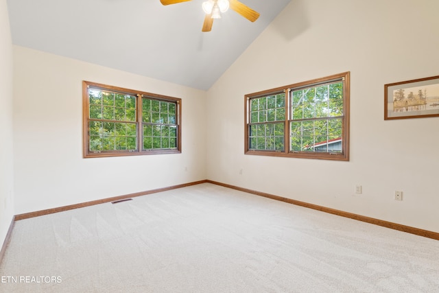 unfurnished room with ceiling fan, carpet, and high vaulted ceiling