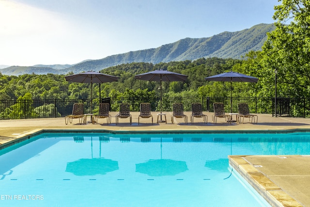 view of pool with a mountain view