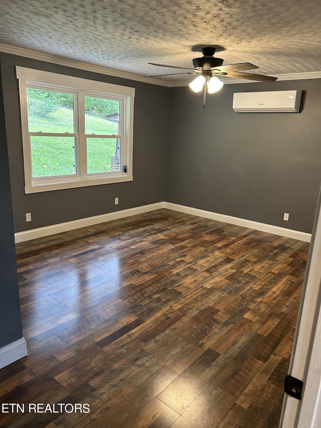 spare room with ornamental molding, ceiling fan, dark hardwood / wood-style floors, and a wall mounted AC