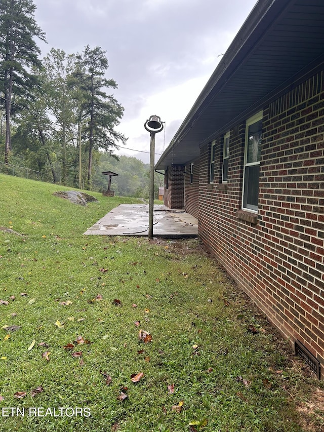 view of yard with a patio area