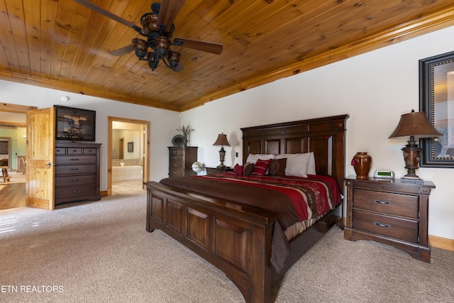 bedroom featuring wooden ceiling, light carpet, ensuite bath, ceiling fan, and ornamental molding