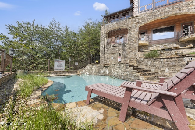 view of pool with a patio