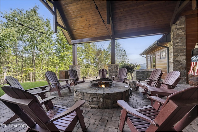 view of patio / terrace with a fire pit