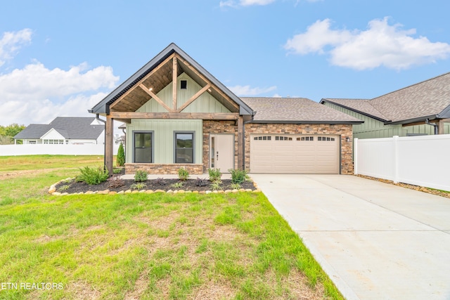 craftsman-style house with a garage and a front yard