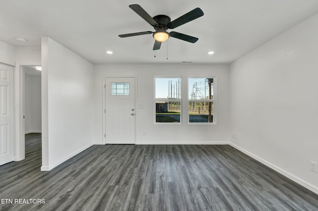 entryway featuring dark hardwood / wood-style flooring and ceiling fan