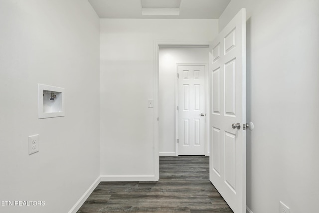 laundry area with hookup for a washing machine and dark hardwood / wood-style flooring