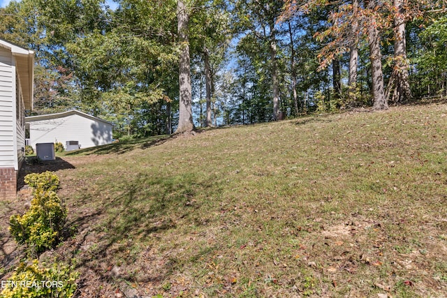 view of yard featuring central AC unit