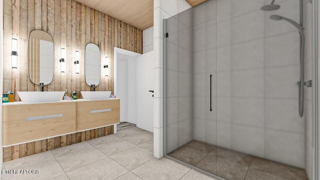 bathroom featuring walk in shower, vanity, wooden walls, and tile patterned flooring