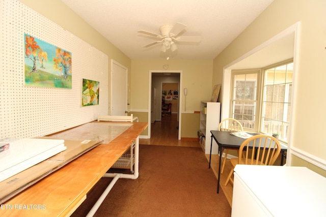 home office with a ceiling fan