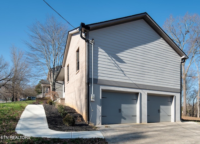 view of home's exterior featuring a garage