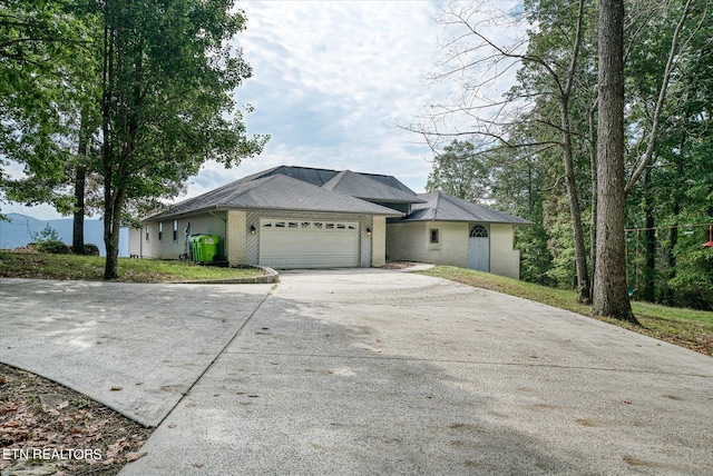 ranch-style home with a garage