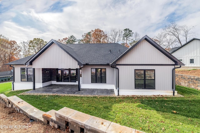 200 Kawga Ln, Loudon, TN 37774 - rear view of house featuring a yard and roof with shingles