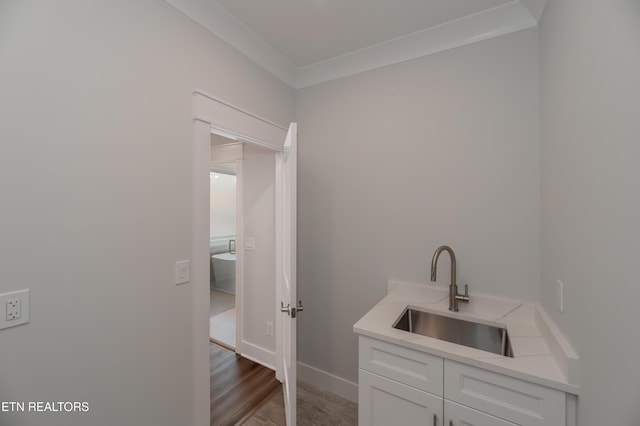 200 Kawga Ln, Loudon, TN 37774 - laundry room featuring a sink and wood finished floors