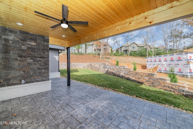 view of patio with ceiling fan