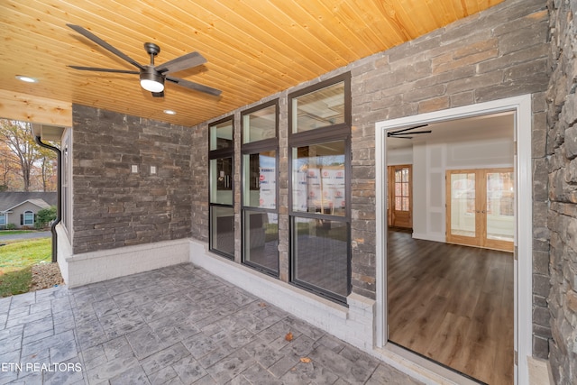 view of patio with a ceiling fan and french doors