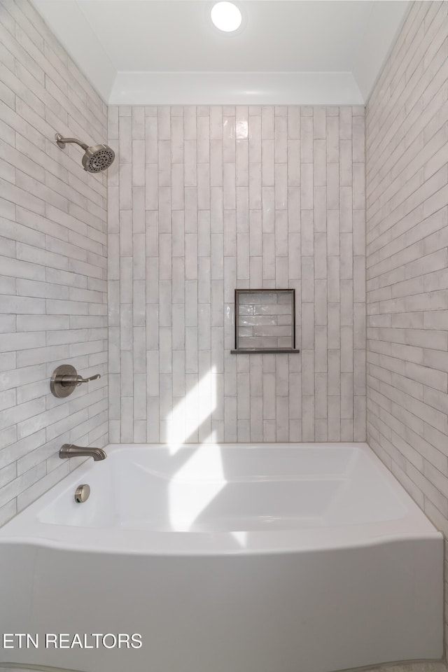 full bathroom featuring shower / bath combination and crown molding