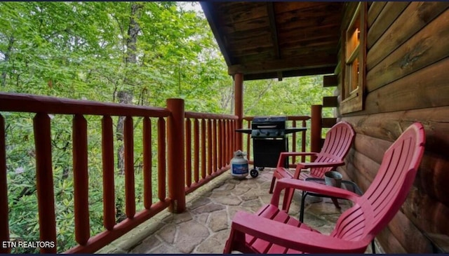 balcony featuring a grill