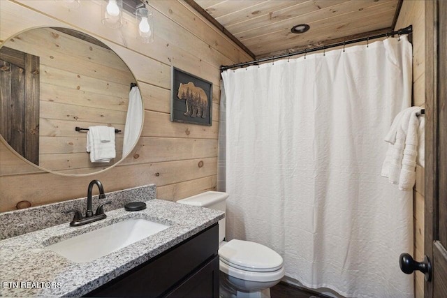 bathroom with wood walls, a shower with shower curtain, wooden ceiling, vanity, and toilet