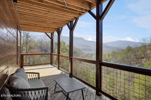 balcony with a deck with mountain view