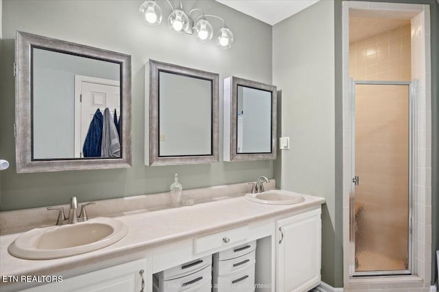 bathroom with vanity and walk in shower