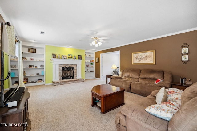 carpeted living room with ornamental molding, a brick fireplace, and built in shelves