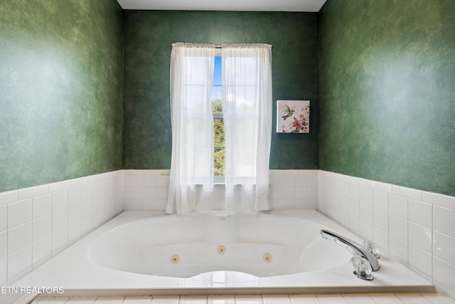 bathroom featuring a tub to relax in