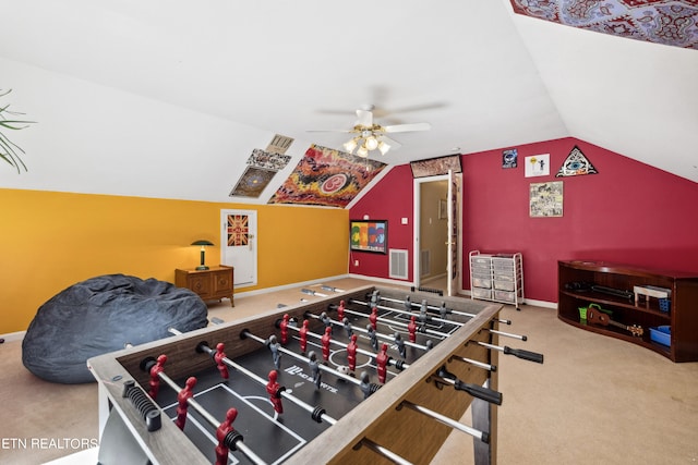 playroom featuring carpet floors, lofted ceiling, and ceiling fan