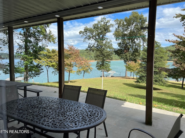 view of patio / terrace with a water view