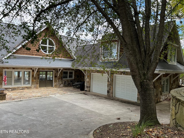 view of front of property with a garage