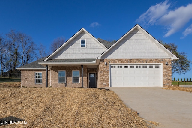 view of front of property featuring a garage