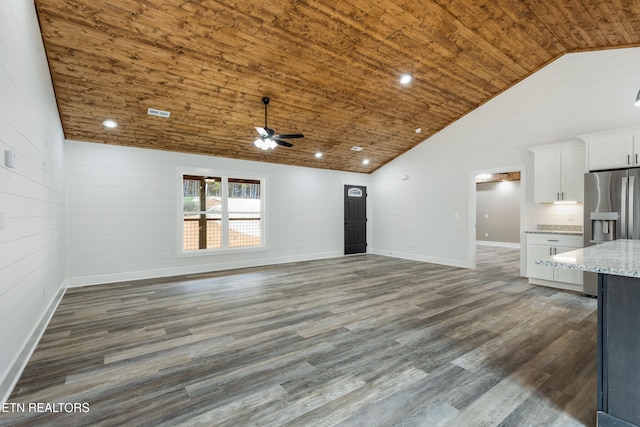 unfurnished living room with high vaulted ceiling, ceiling fan, dark wood-type flooring, and wood ceiling